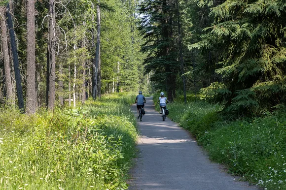 Bikers on the Apgar Bike Path in Glacier National Park